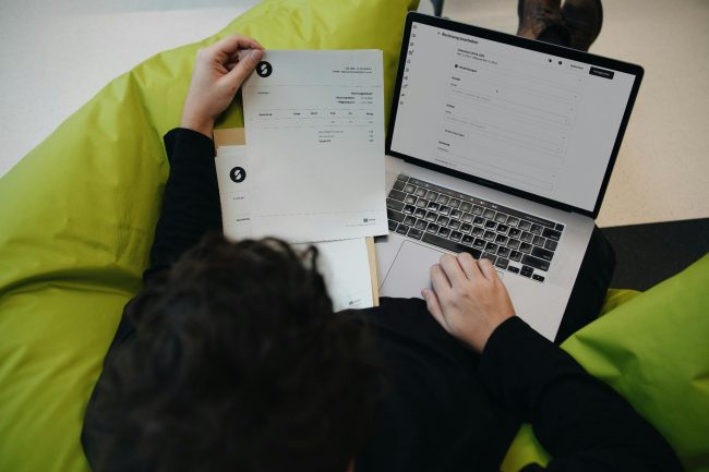 A Person Holding A Paper